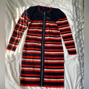 This red, navy, and tan knit Karen Mullen dress is new with tags.